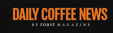 A black square graphic with large orange text reading 'DAILY COFFEE NEWS' and smaller white text below reading 'BY ROAST MAGAZINE'.