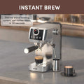 Espresso machine brewing a cup of coffee